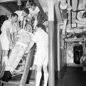 Casualty Drill on Board HMS Adamant. 16 April 1942, in the South Atlantic. Medical and Stretcher Parties on Board Practising With An Able Seaman As Casualty. A8834.jpg