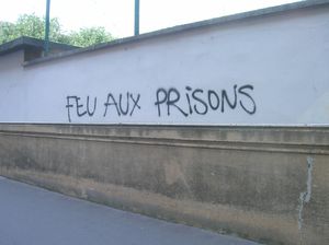 Action de solidarité avec les prisonnier.es à Roanne, blocage de circulation