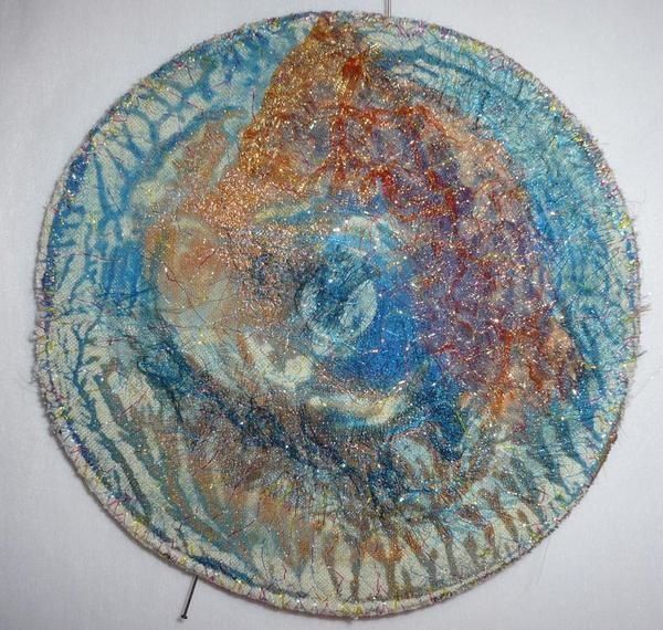 récup de CD pour une déco textile